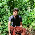 chris thorogood with rafflesia arnoldii the largest flower in the world in sumatra