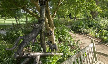 phillip pullman  oxford botanic garden  deamon sculpture  lower garden