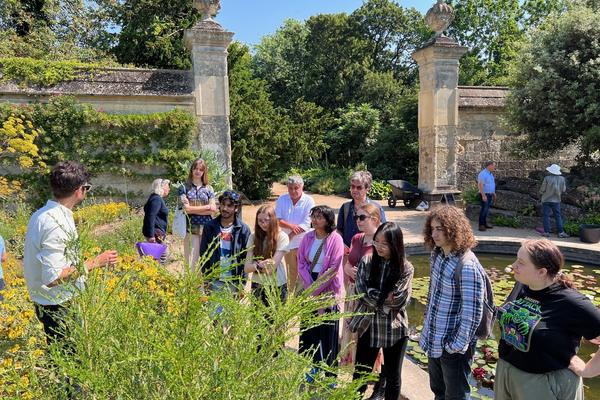 Students learning about Oxford Botanic Garden.