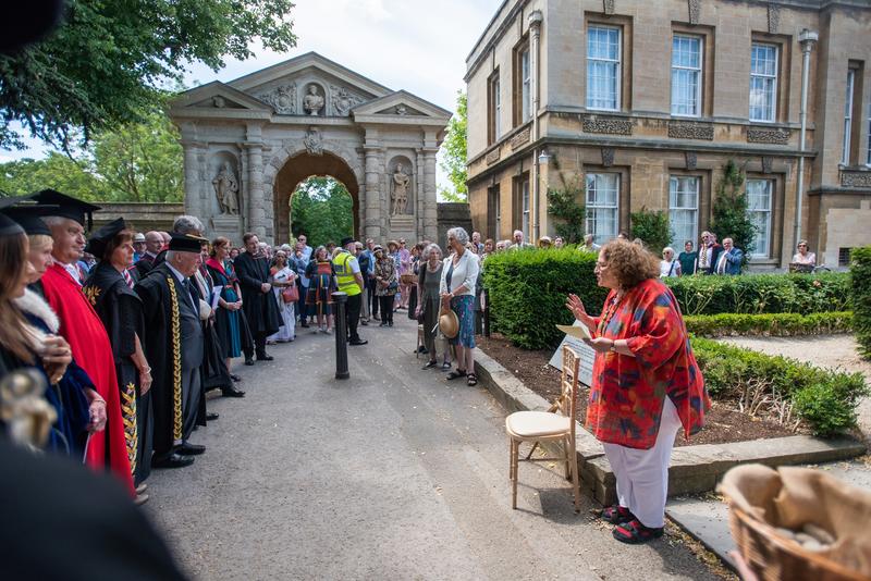 Historian Pam Manix addresses guests at the site of the Jewish cemetery