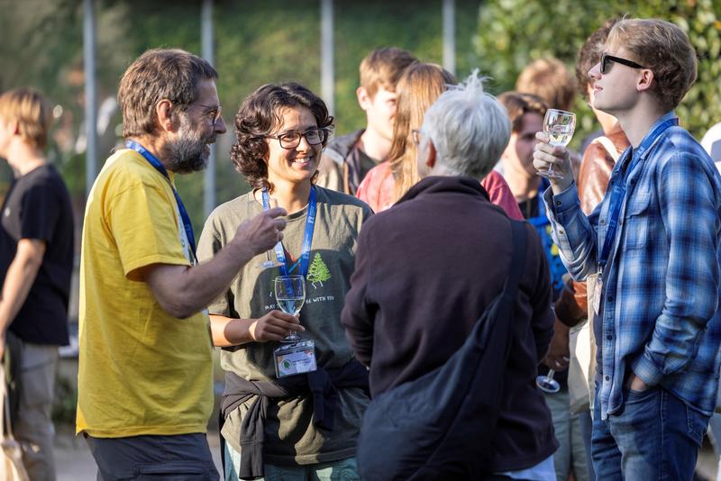 Guests enjoying a drinks reception at Oxford Botanic Garden